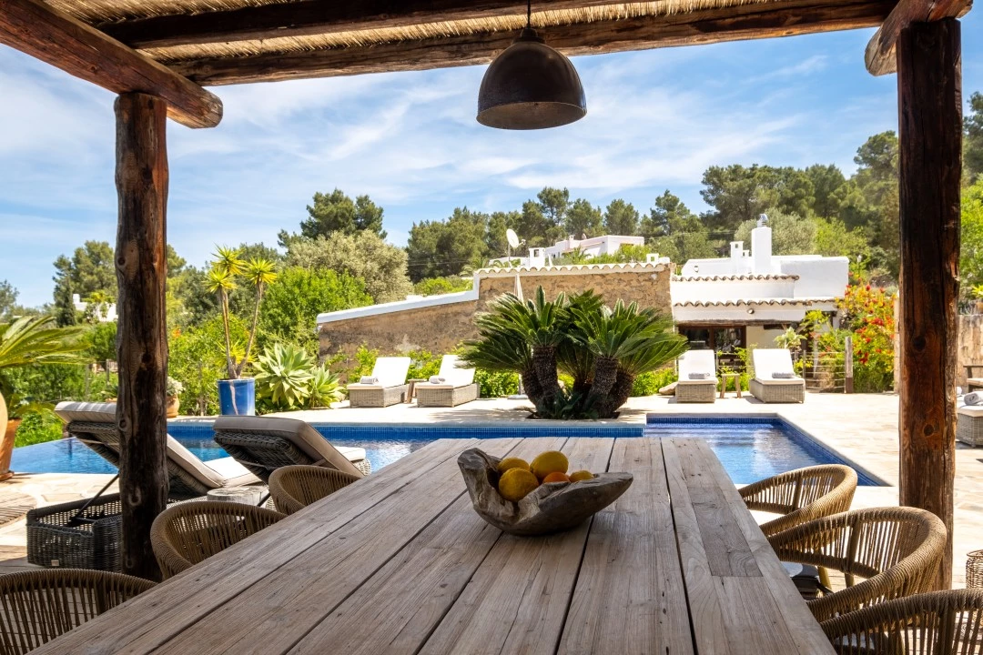 1684146341-Prospectors Luxury real estate Ibiza to rent villa Can Xauret spain property dining chill pool rental outside.webp